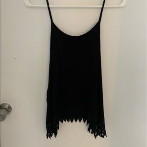 Black tank top with details on the bottom